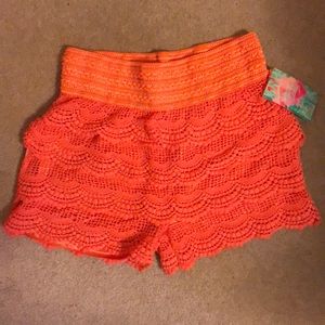 M/L new with tags stylish orange shorts